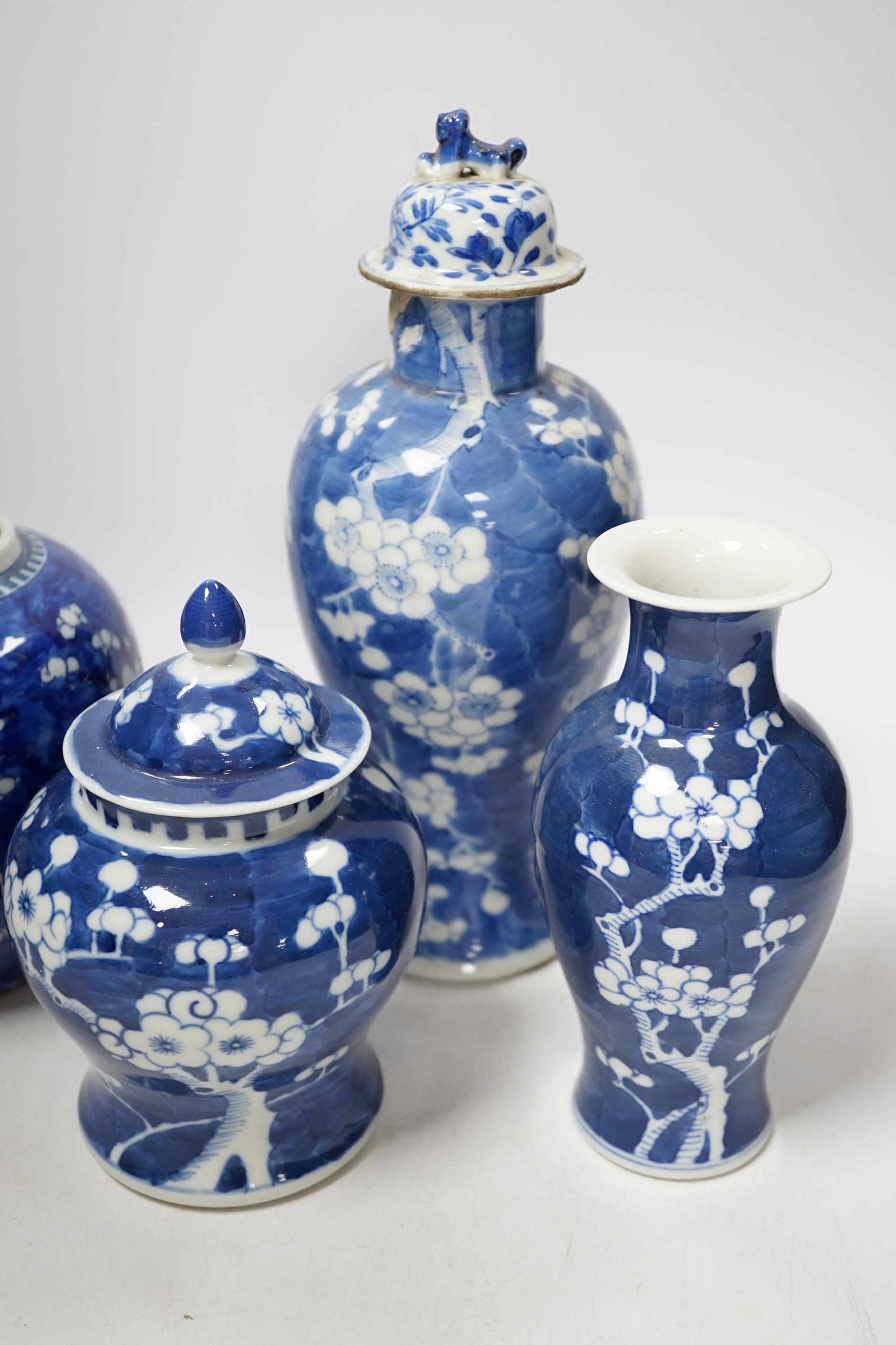 Two Chinese prunus jars and two vases, early 20th century, tallest 26cm